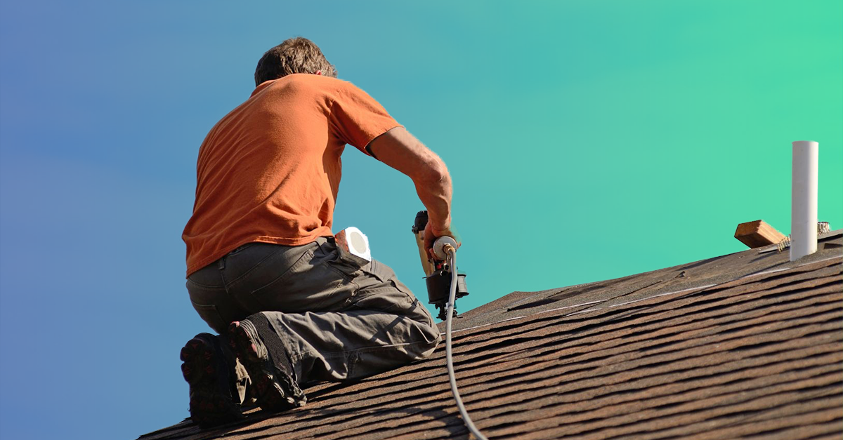 person working on roof 